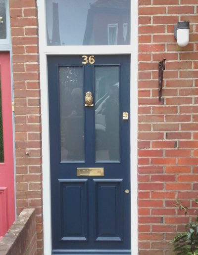 blue number 36 timber front door