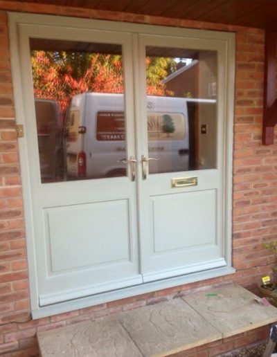 white timber pairs front door